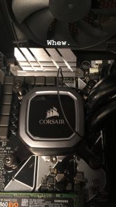 Corsair CPU cooler in place on the motherboard.